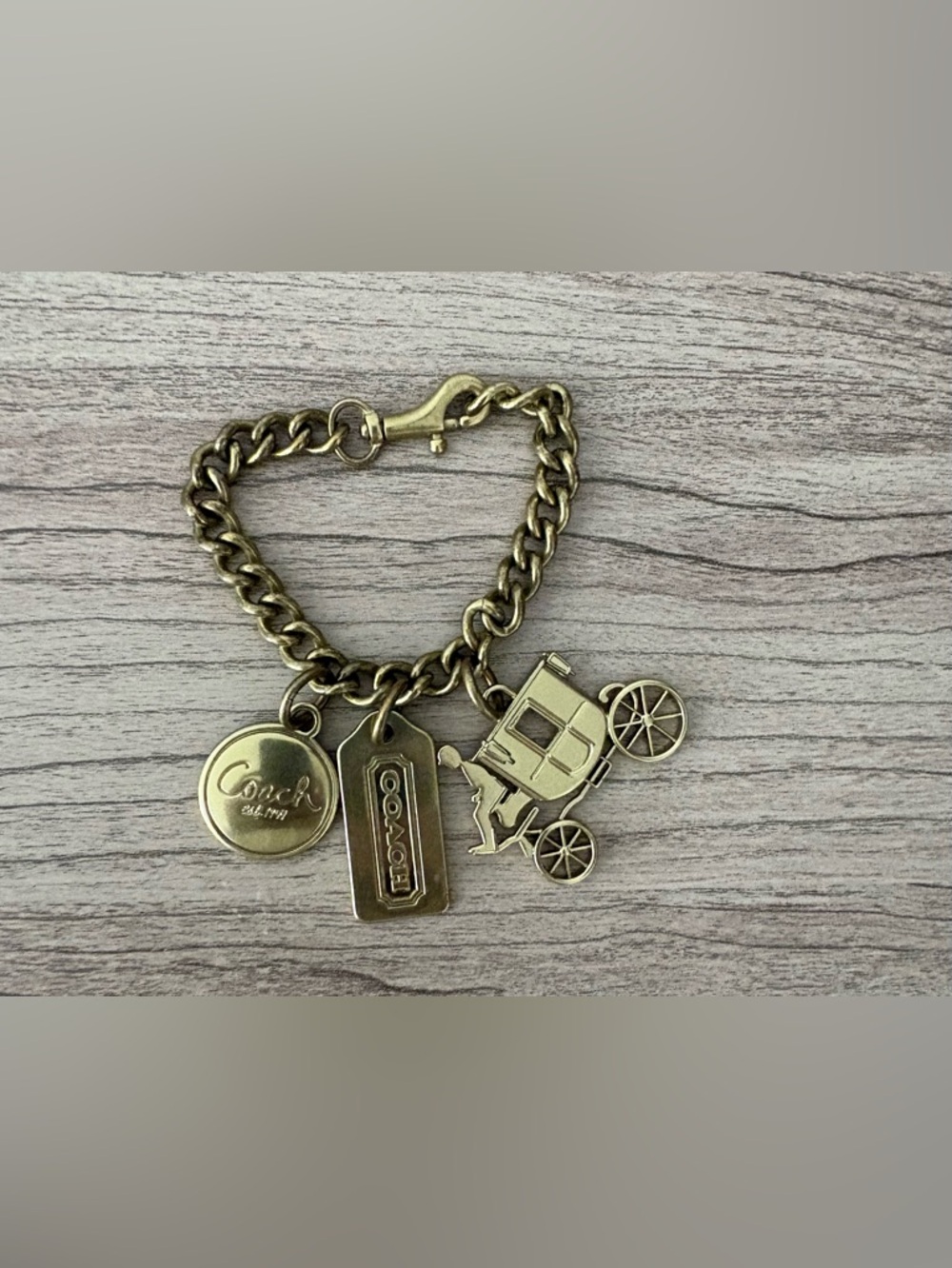 Coach Antique Brass Charm Bracelet - Signature Carriage and Tag